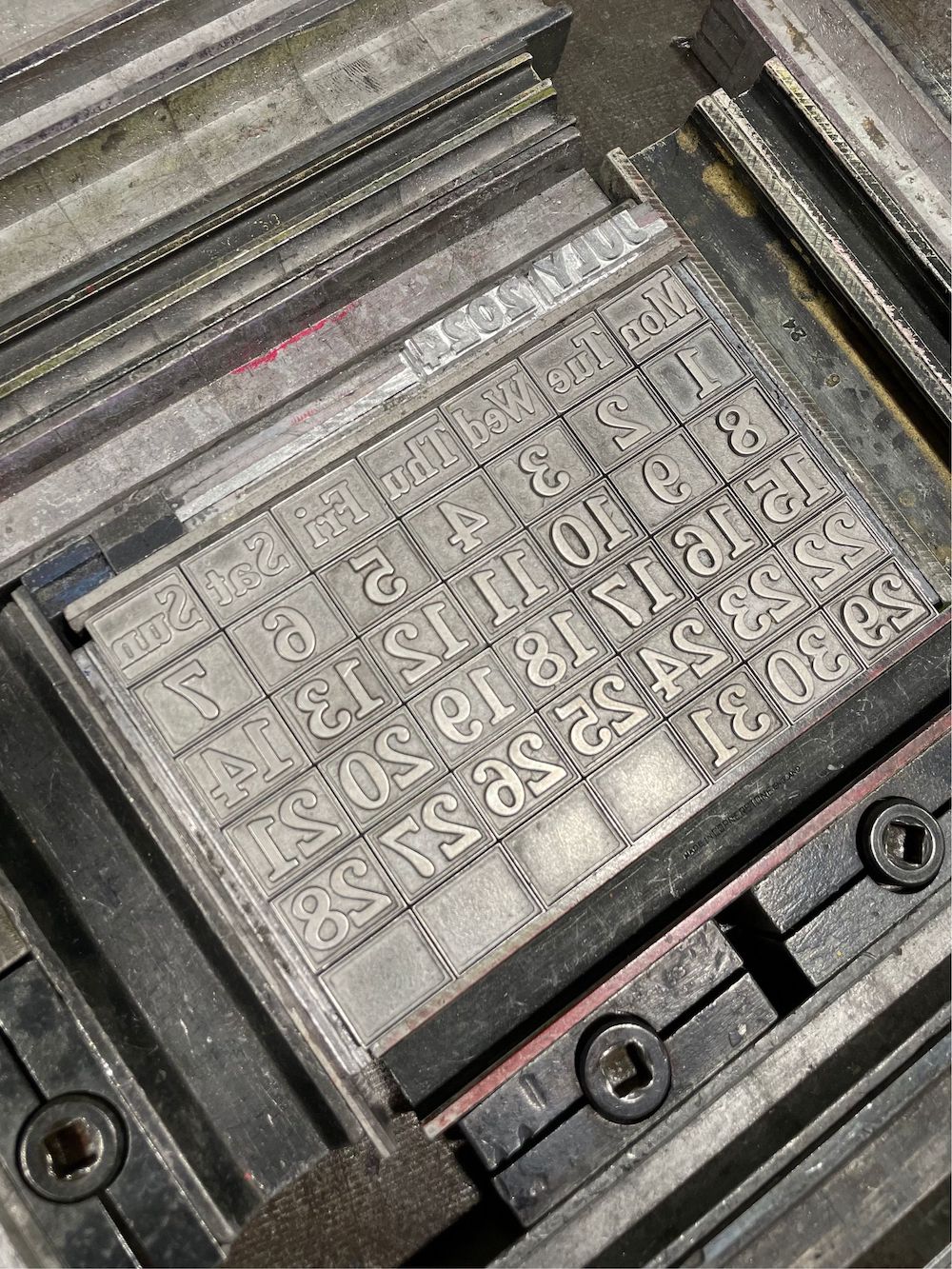 2024 calendar month typeset with metal type