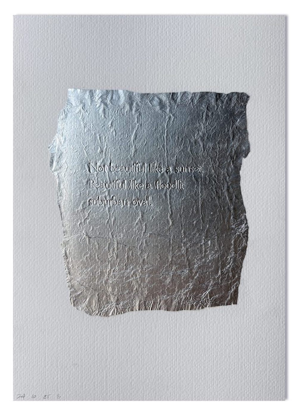 One of Beth George's prints featuring letterpress printed text on silver foil on  white stock