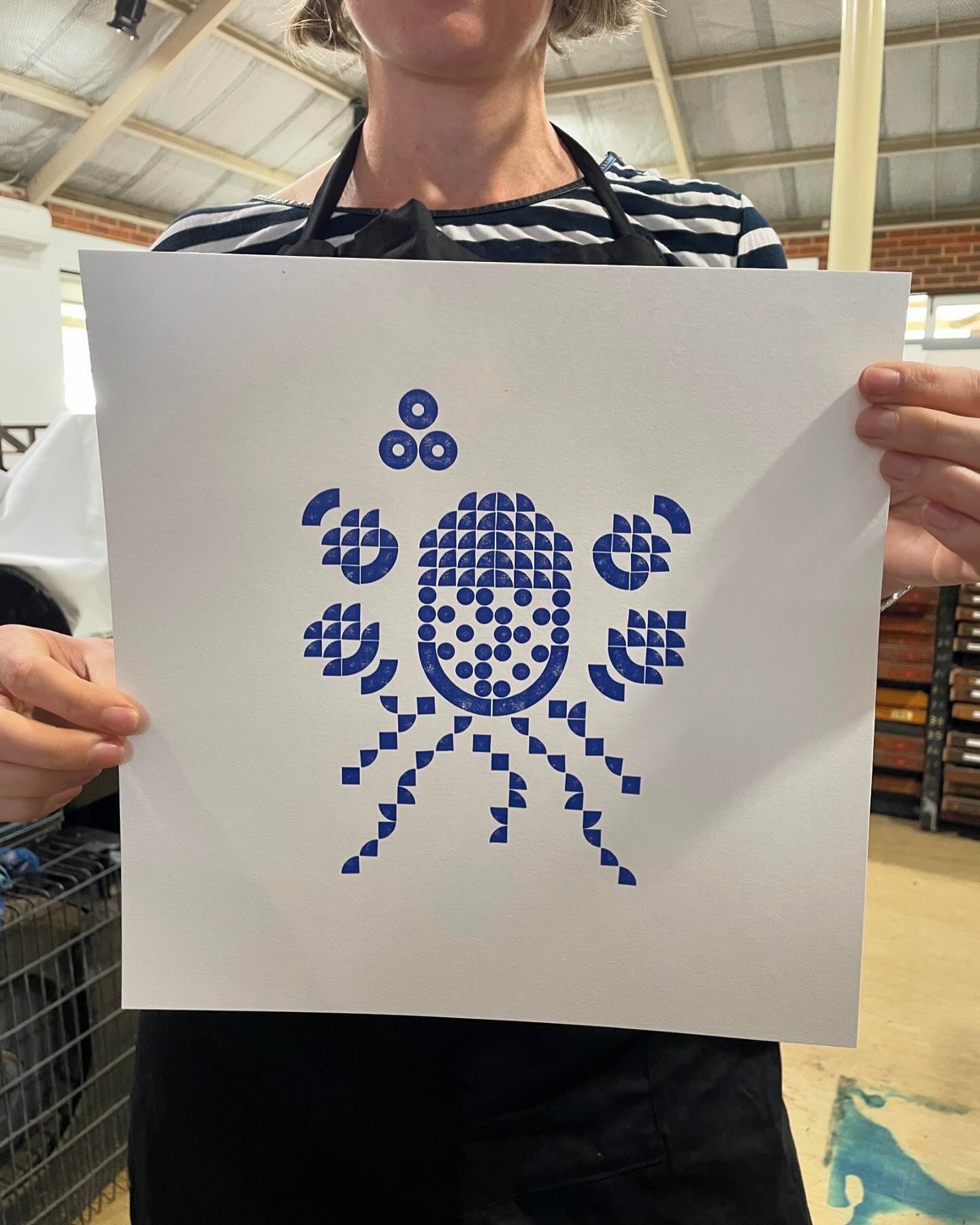 A floral arrangement featuring a banksia created and printed with lego tiles.